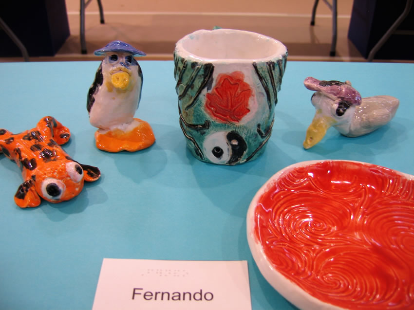 Ceramic frog, birds, cup and dish.