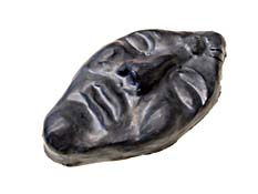 Dark gray, face mask sculpture.