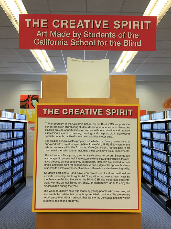 Description of "The Creative Spirit" program displayed on a large posterboard in the Library.