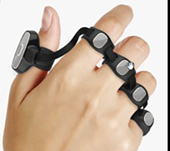 Tap Strap 2 is being shown on a hand